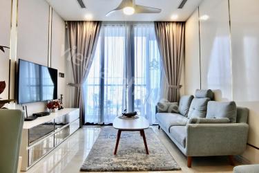 Showing large living space, sunlit balcony with district views