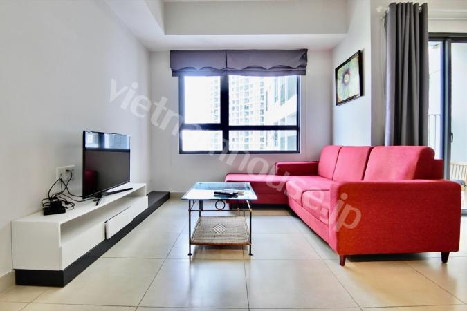 Brilliantly red sofa right at the lounge of Masteri Thao Dien