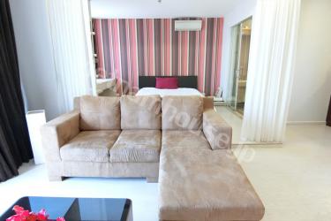 White curtain replacing blank bedroom wall in City Garden