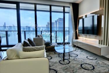 Two-bedroom apartment with living room space filled with light from a large balcony