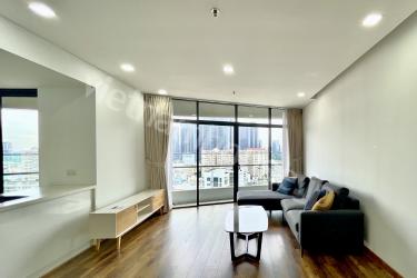 Warm, natural wood-toned apartment with premium view at City Garden