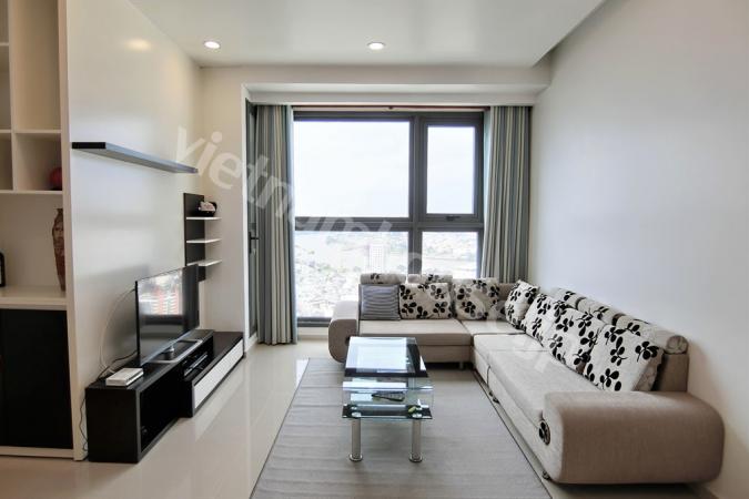 The apartment is full of sunshine with wide windows throughout the rooms