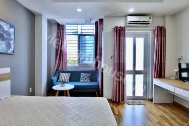 Well lit serviced apartment and its washing machine