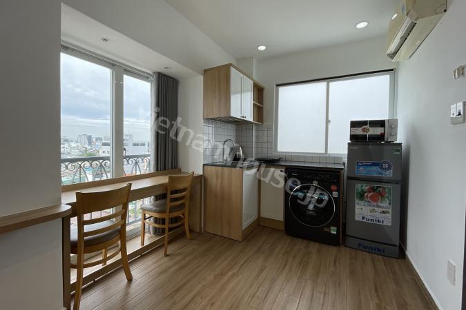 Sun-drenched 2-bedroom serviced apartment with premium city view
