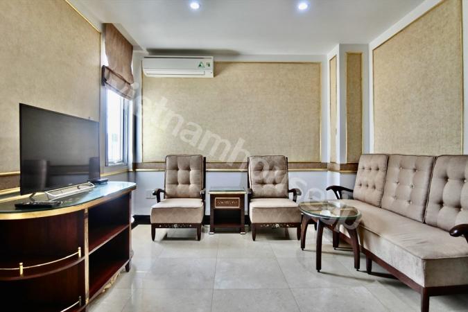 The serviced apartment with deep tones exudes luxury