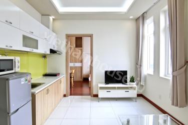 One bedroom serviced apartment in District 1, spacious balcony and large glass windows.