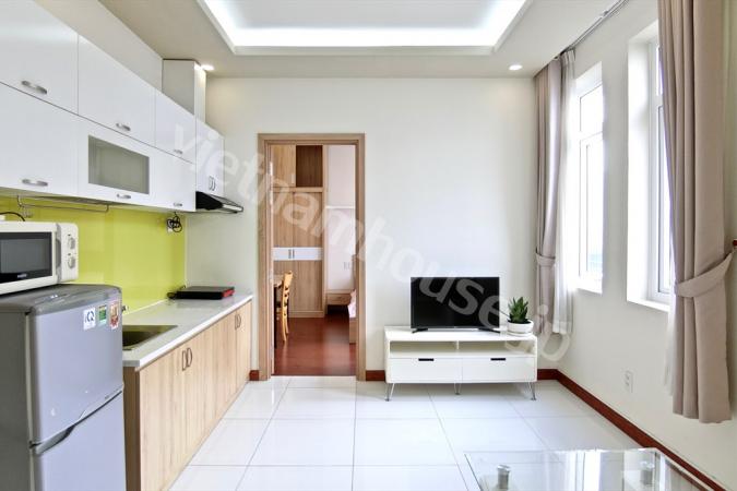 One bedroom serviced apartment in District 1, spacious balcony and large glass windows.