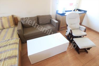 Warm tone studio service apartment near Ben Thanh Market