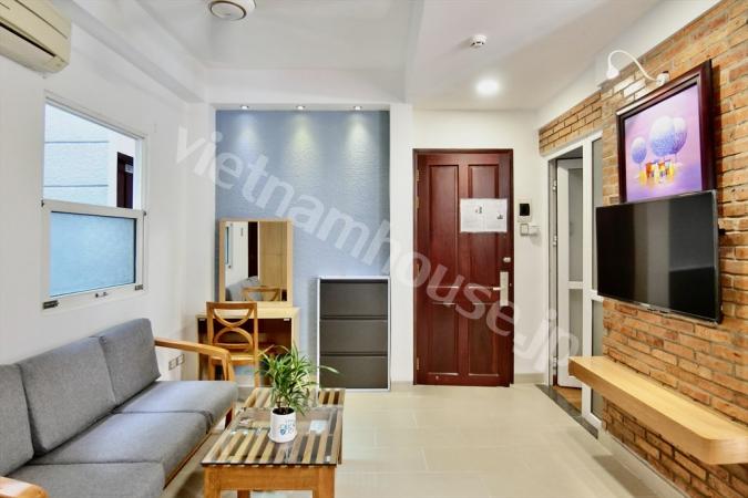 Minimalist style in natural wooden color in the center District 1