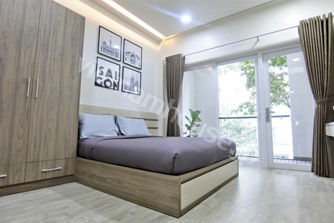 Enjoy a cup of coffee at balcony in apartment near Ben Thanh market.