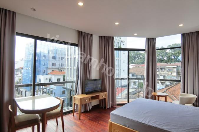 Luxurious apartment with sliding doors leading to big balcony