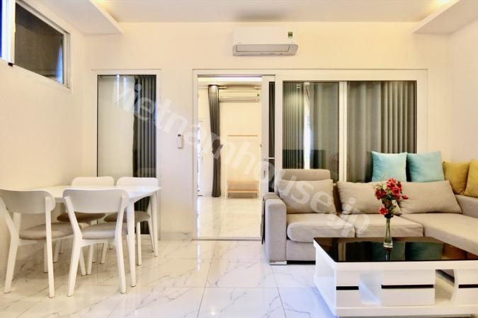 Top floor serviced apartment with big balcony