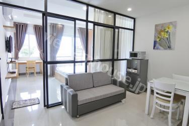 Apartment with a modern bedroom, is surrounded by glass frames and curtains, super impressive