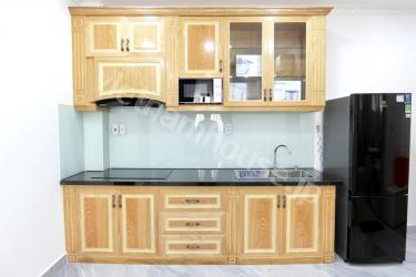 Equipped washing machine in bathroom for tenants