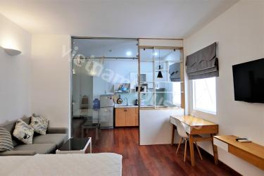 Glass door between kitchen and bedroom in serviced apartment District 3