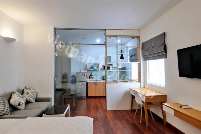 Glass door between kitchen and bedroom in serviced apartment District 3
