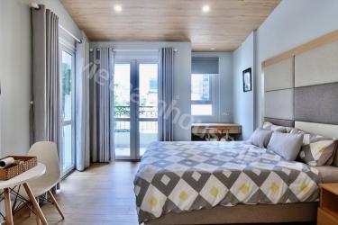 Two balconies for a corner apartment