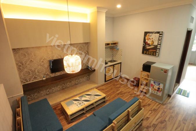 Blue sofa in cozy apartment in District 1.