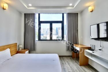 A beautiful scene of tree-lined highway and Landmark 81